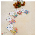 کش مو مهره دار رنگی